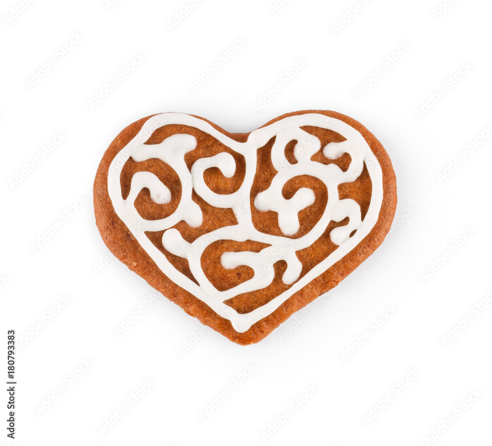 Gingerbread in the form of heart - Christmas homemade sweet cookie, isolated on white background