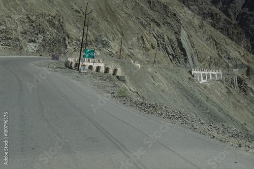 Steep, narrow mountain road photo