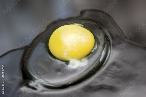 break egg on black background photo