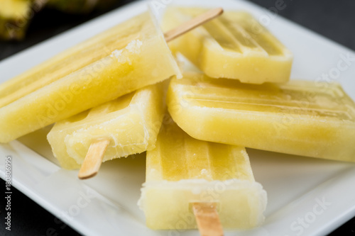 Homemade Pineapple Popsicles (selective focus)