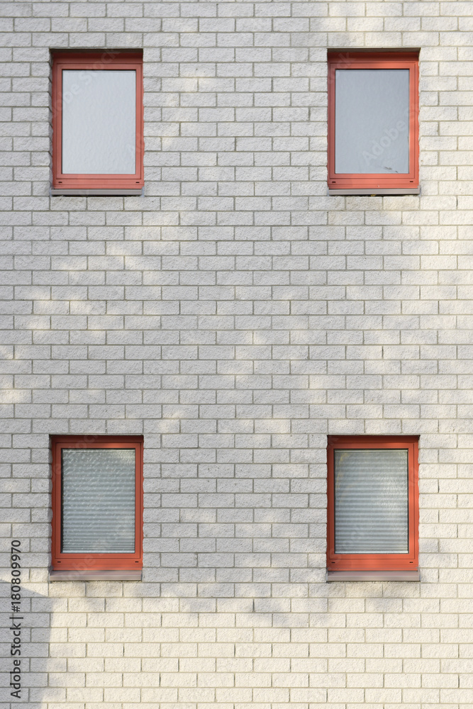 White brick wall with windows White brick wall with windows
