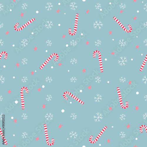 Christmas seamless pattern with striped lollypops, stars and snowflakes