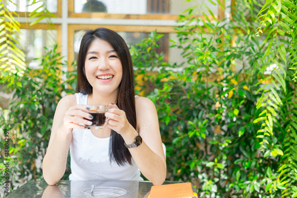 happy girl look at camera laughing and smiling in cafe happy girl look at camera laughing and smiling in cafe