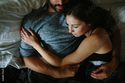 Black and white couple sleeping