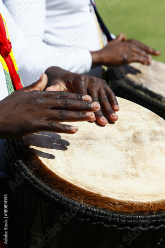 African drummer playing a djenbe