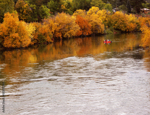 River with Autumn Reflections and Kayaker