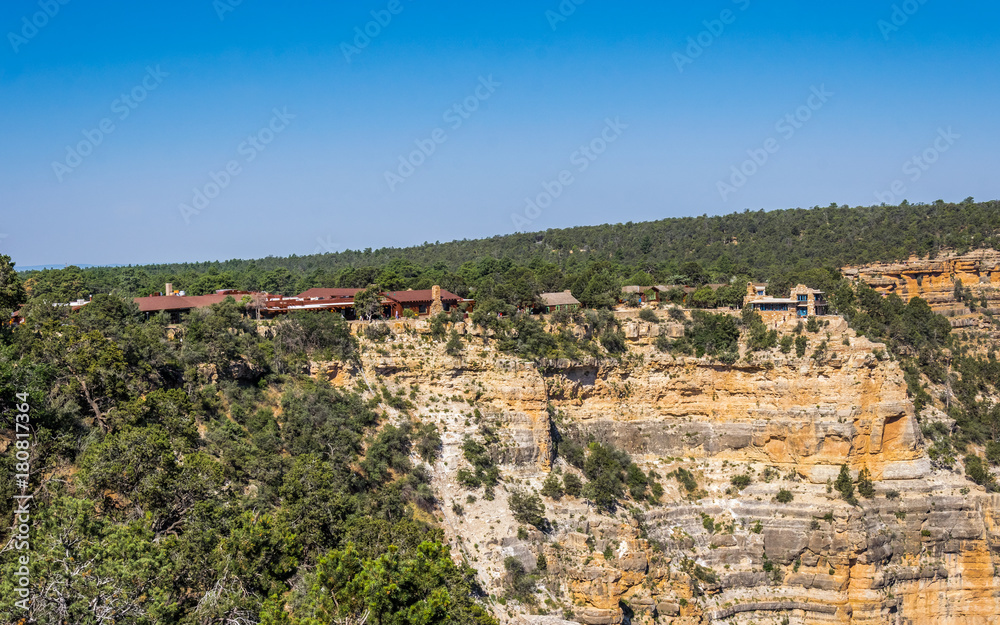 Houses on the edge of the cliff. A picturesque panorama of the Grand Canyon Village in the Grand Canyon National Park. Arizona, United States