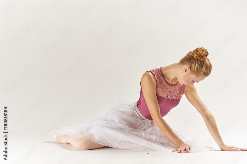 ballerina in pink hands on the floor ballerina in pink hands on the floor