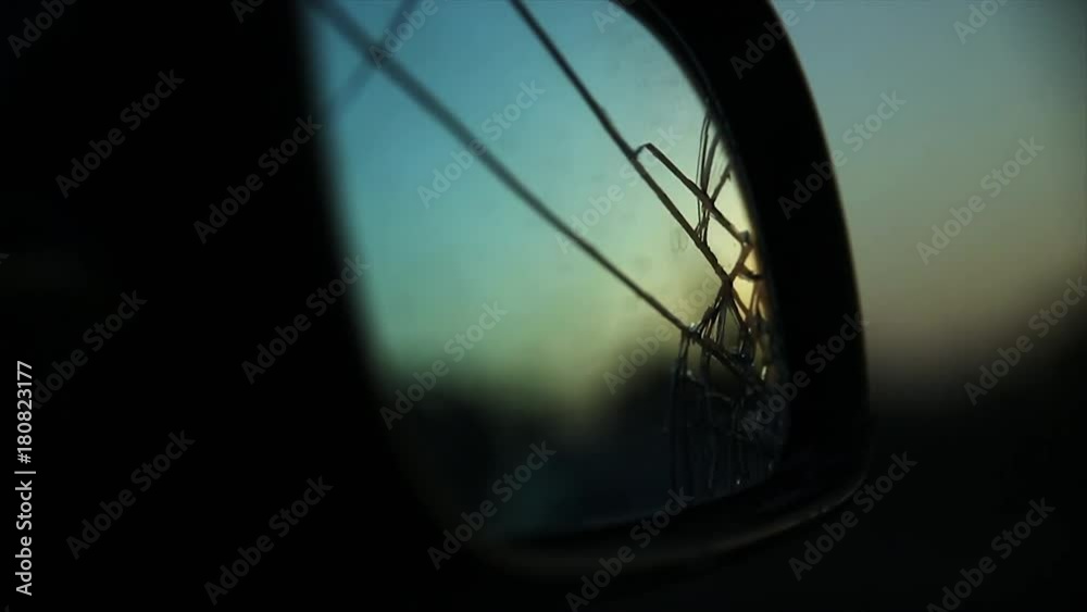 Close up, broken side view mirror on car