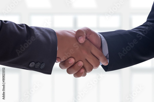 businessman handshake Professional Business partnership meeting concept Silhouette and filter sun