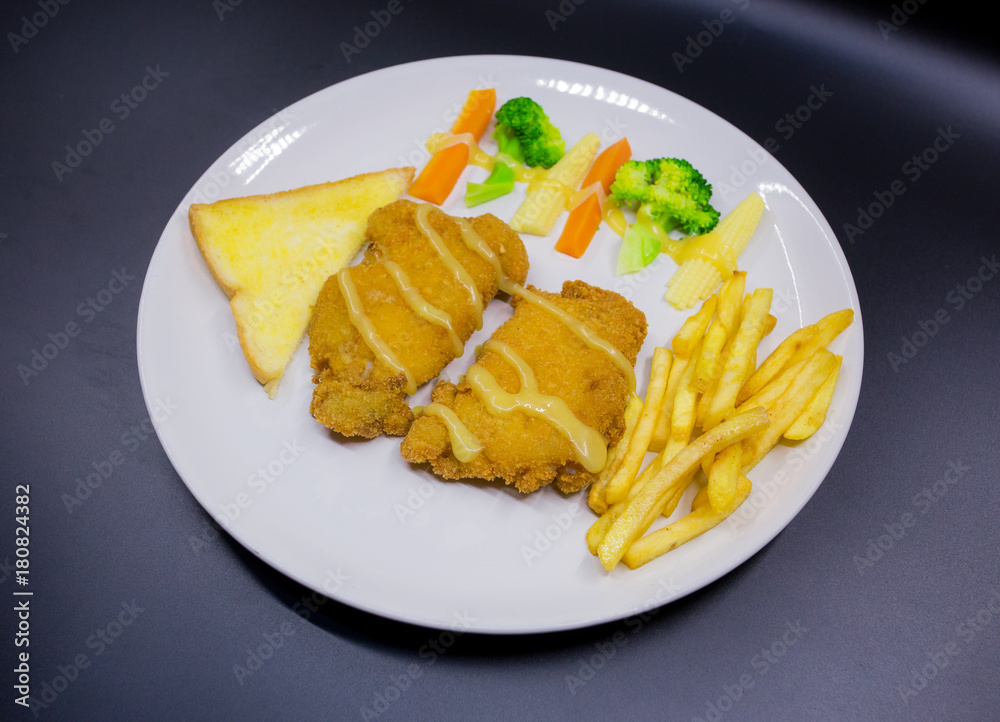 Fried fish steak in plate Fried fish steak in plate
