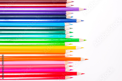 line of colored pencils white background, a symbol of LGBT