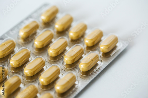 Yellow tablets in packing.