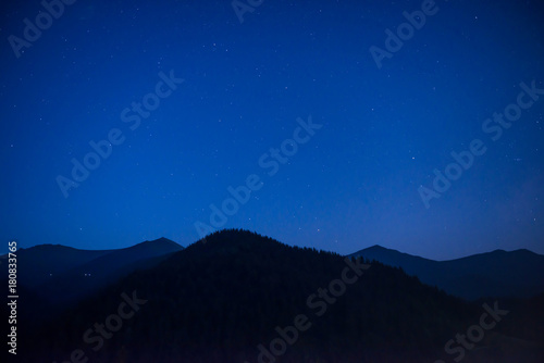 Silhouette of mountain range at night © Pavlo Vakhrushev