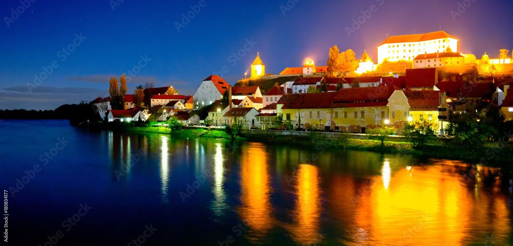 Town of Ptuj and Drava river evening riverfront view