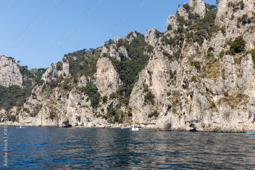 View from the boat on the cliff coast of Capri Island, Italy View from the boat on the cliff coast of Capri Island, Italy