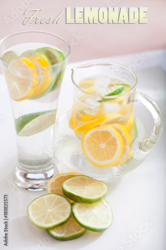 Retro advertisement with lemon slice and glass of fresh lemonade.
