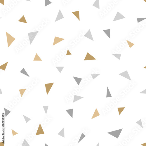 Simple geometric seamless pattern with small golden and silver triangle forms. Repeat small gold color glitter figures. Vector holiday decor background.