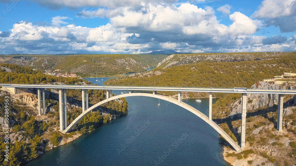 Aerial panorama view with bridge and sea around islands. Beautiful landscape surrounded with blue sea with bridge.