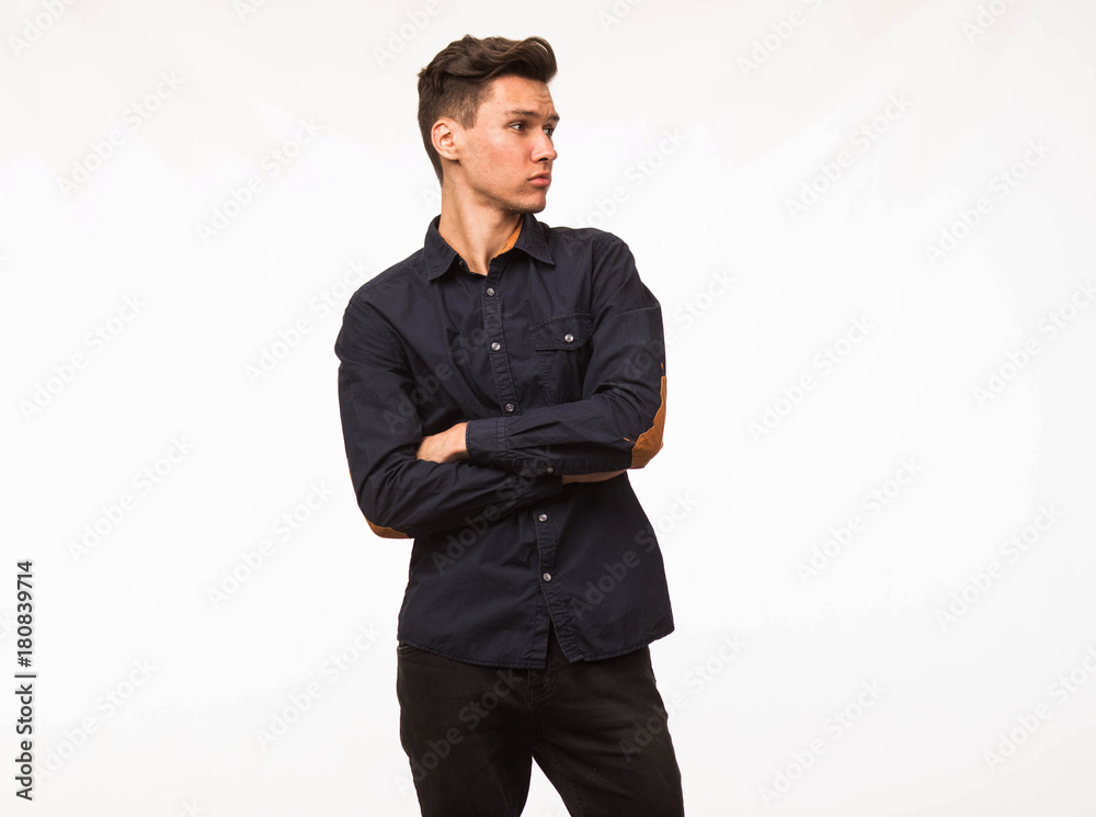 Young confident man portrait of a businessman on a gray background. Ideal for banners, registration forms, presentation, landings, presenting concept. Young confident man portrait of a businessman on a gray background. Ideal for banners, registration forms, presentation, landings, presenting concept.