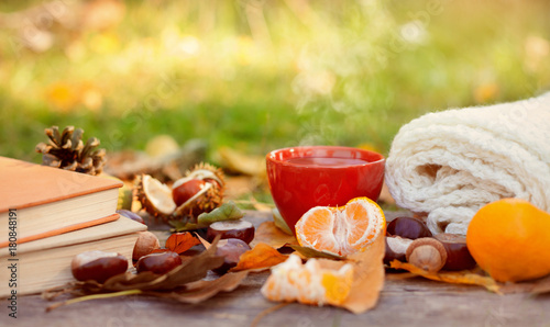 Autumn fallen leaves and hot drink