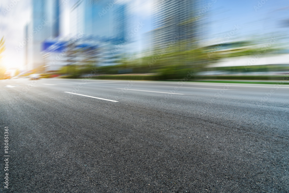 empty asphalt road front of modern buildings. empty asphalt road front of modern buildings.