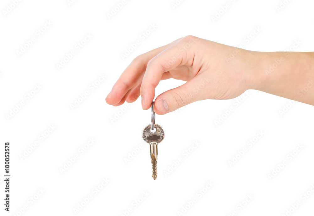 Hand holds keys. Isolated on white background. Hand holds keys. Isolated on white background.