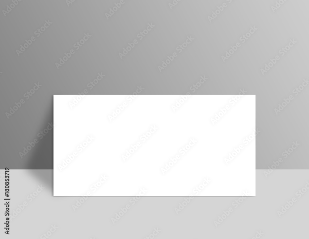 White blank stationary near the grey wall with shadow. Close up magazine, book, brochure, flyer, a4 letterhead, folder, leaflet, booklet