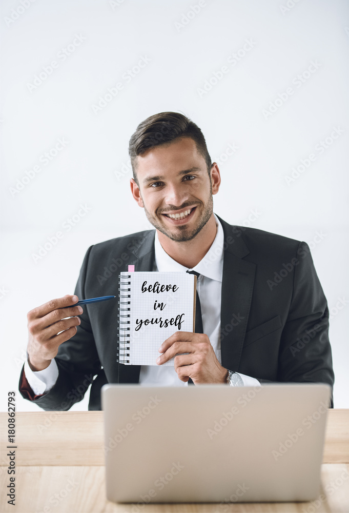 businessman pointing at notebook businessman pointing at notebook