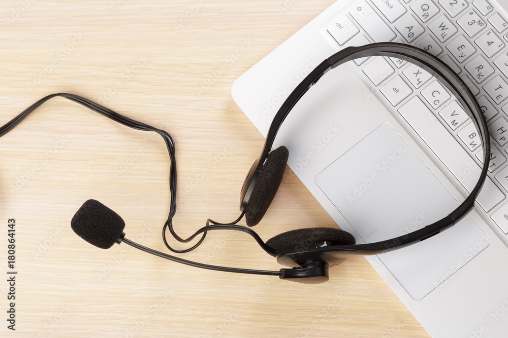 headset on keyboard computer laptop