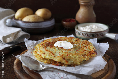 French cuisine. Pomme darphin: roasted pancakes from raw grated potatoes