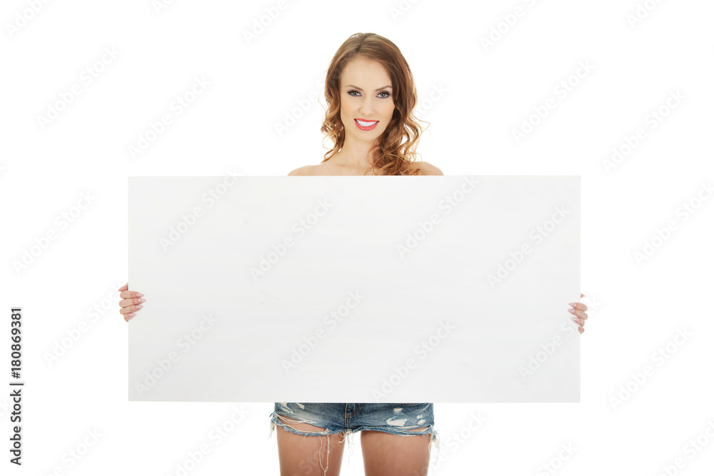 Woman in shorts with empty banner. Woman in shorts with empty banner.