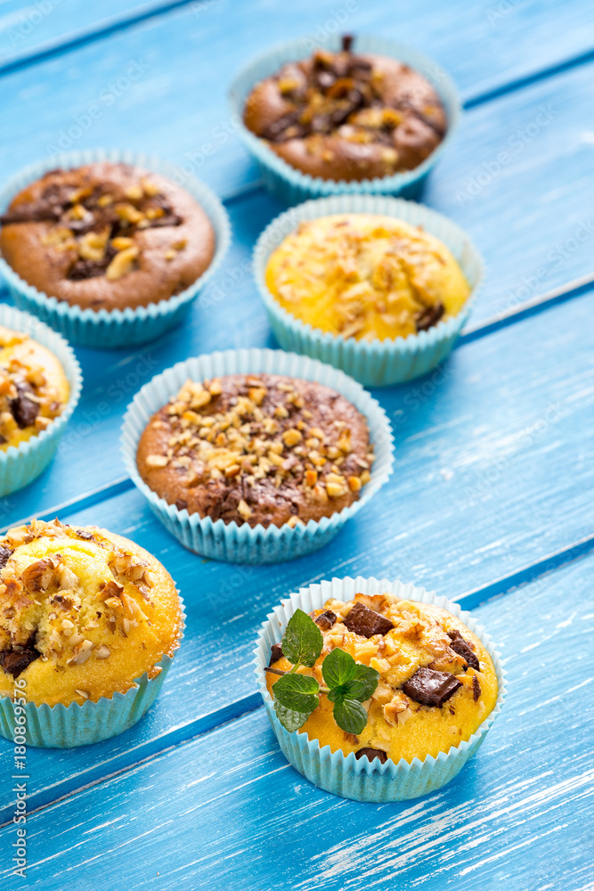 Fresh muffins with nuts and chocolate