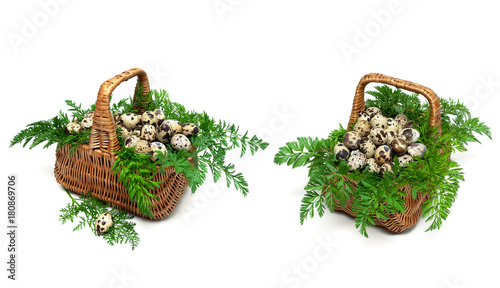 two baskets with quail eggs isolated on white background