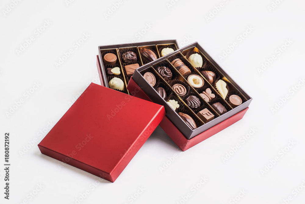 Box of chocolate pralines red ready for a exquisite gift Box of chocolate pralines red ready for a exquisite gift