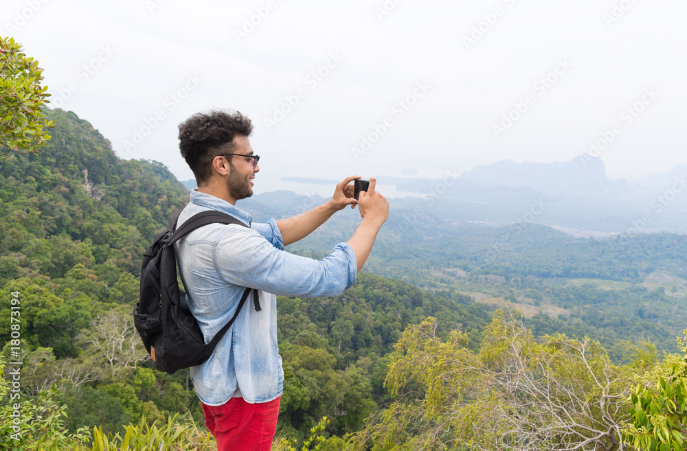 Woman With Backpack Take Photo Of Landscape From Mountain Top On Cell Smart Phone, Young Guy On Hike Woman With Backpack Take Photo Of Landscape From Mountain Top On Cell Smart Phone, Young Guy On Hike