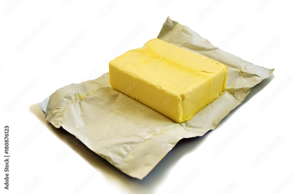 Opened butter package on table. Butter prices are at a record high. cooking with butter.