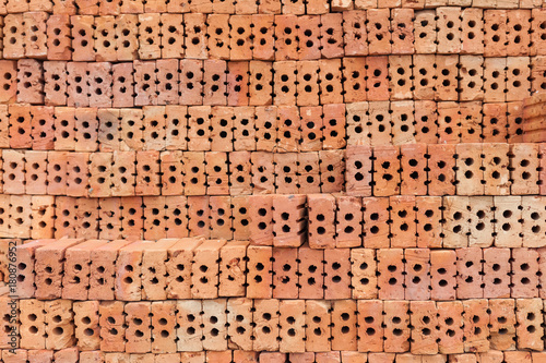 Red brick overlap.Red brick used in the construction of the wall.Red brick made of clay fire.