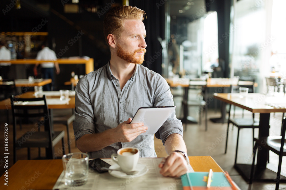 Businessman holding tablet Businessman holding tablet