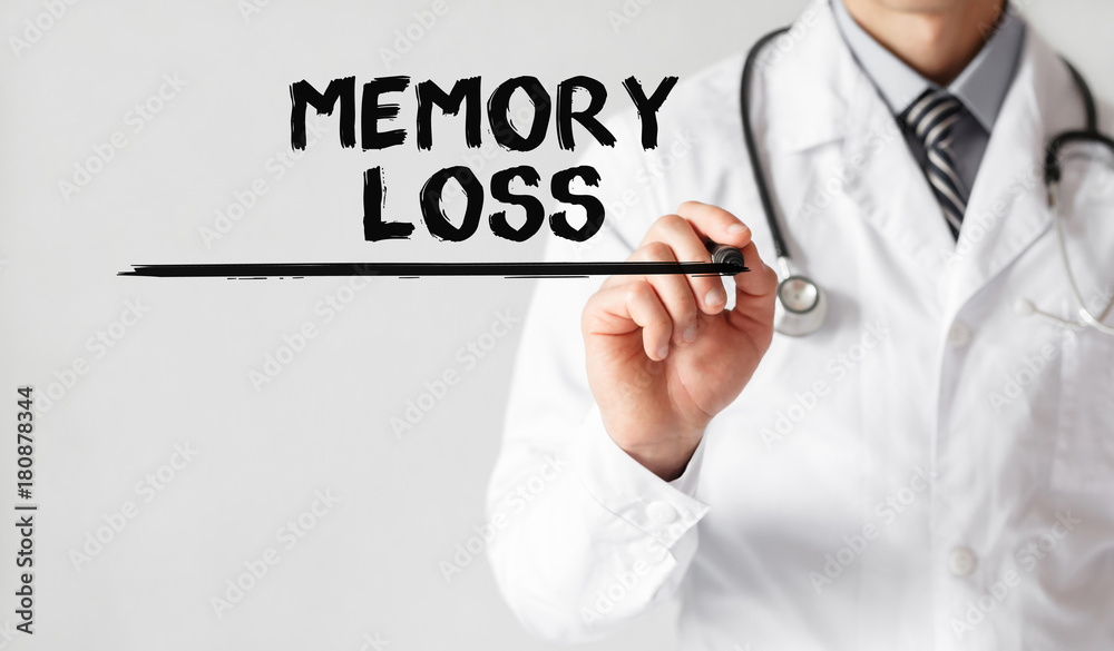 Doctor writing word memory loss with marker, Medical concept Doctor writing word memory loss with marker, Medical concept
