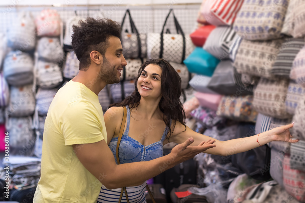 Φωτογραφία Young Couple On Shopping Choosing Bag, Man And Woman Happy Smiling In Retail Sto