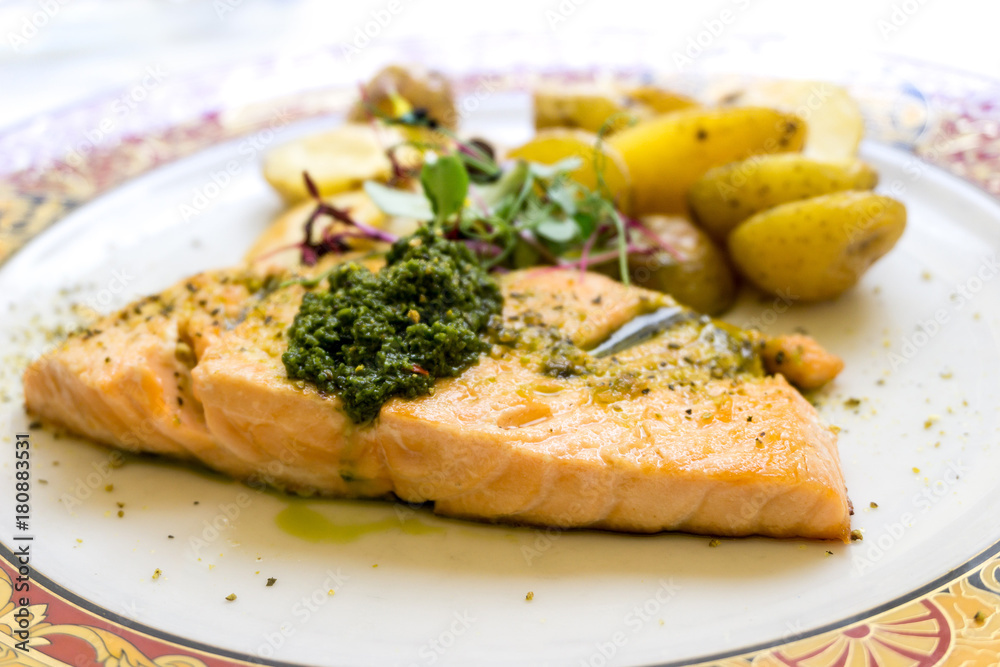 Grilled Salmon with fresh lettuce and mash potatoes Grilled Salmon with fresh lettuce and mash potatoes