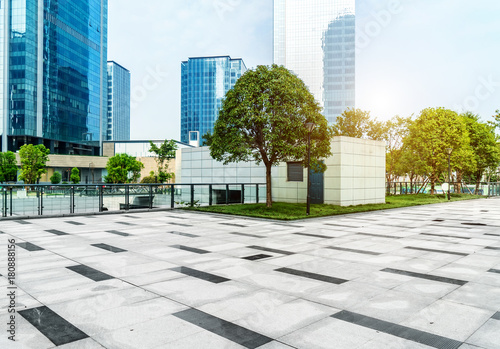 Panoramic skyline and buildings with empty concrete square floor