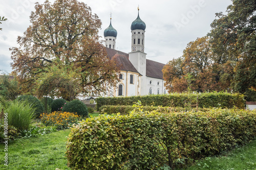 The towers of Benediktbeuern Abbey with the gardens photo