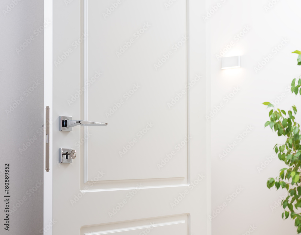 Obraz premium The open white interior doors. Modern chrome handle and lock with key