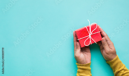 Cute gift box in male hand.celebration anniversary and party concepts © hakinmhan