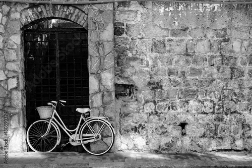 Old streets of Cefalu,Sicily photo