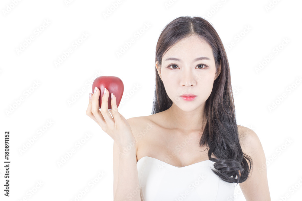 Beautiful Asian Woman Holding Apple on white background. Fashion Beauty Model isolated on white Beautiful Asian Woman Holding Apple on white background. Fashion Beauty Model isolated on white