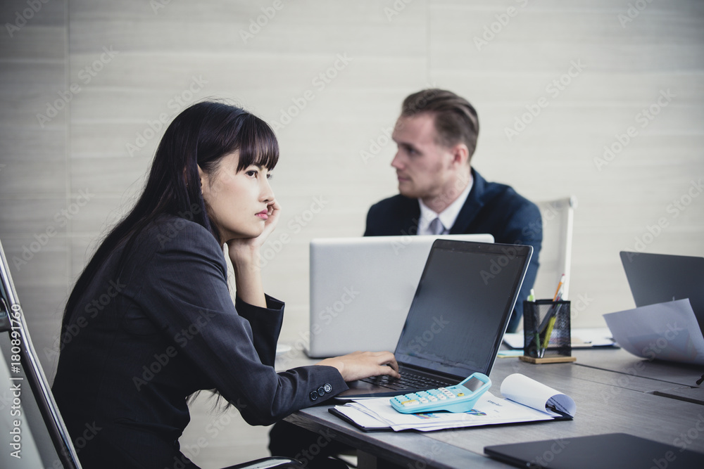 Asian business woman feeling bored with meeting. People working Concept. Vintage Tone. Asian business woman feeling bored with meeting. People working Concept. Vintage Tone.