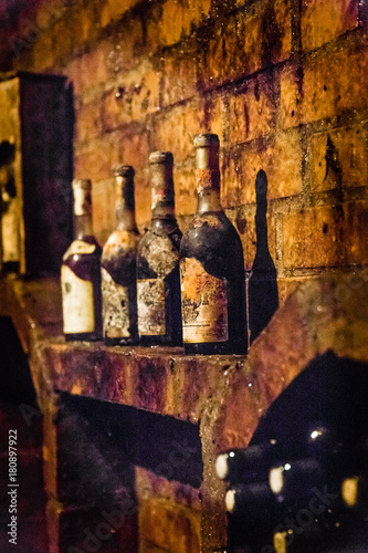 Wine bottles on display in a Hungarian wine cellar